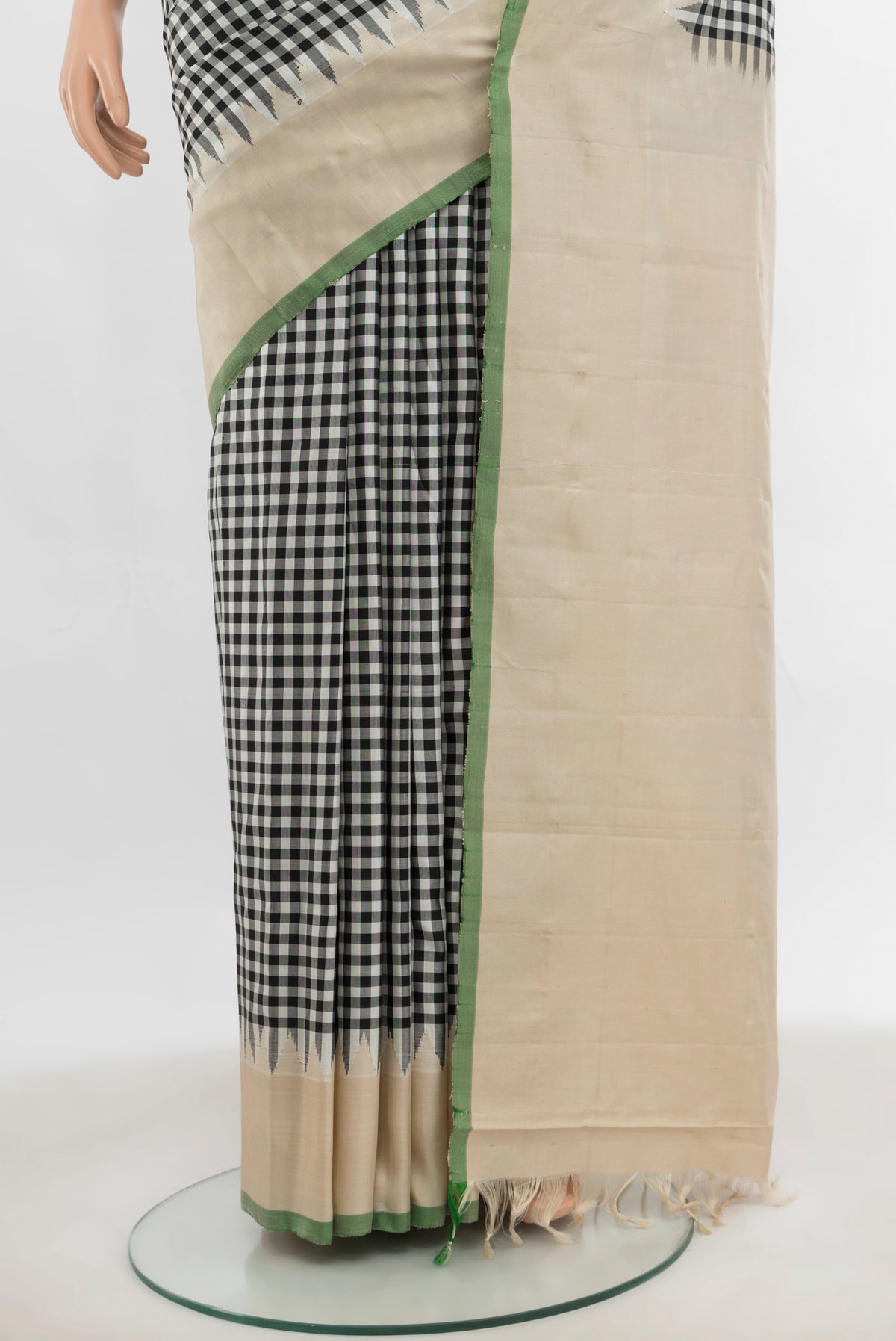 Pleats and pallu of Multi Color Gadwal Silk Saree with Zari Butta on the body and Silk Border. 