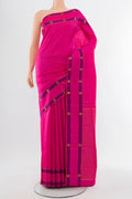 Rani Pink Kanchipuram Silk Saree with Zari Butta on the body and Silk Border.  displayed on a mannequin