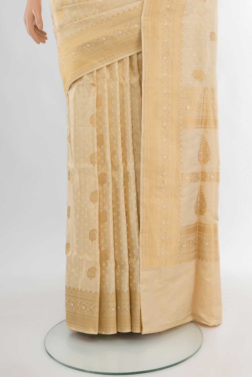 Pleats and pallu of Sandal Banarasi Silk Saree with Jacquard With Thread Butta on the body and Zari Border. 