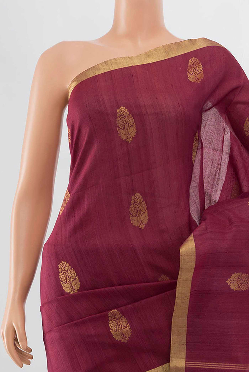 Border image of Maroon Tussar Silk Saree with Zari Butta on the body and Silk Border