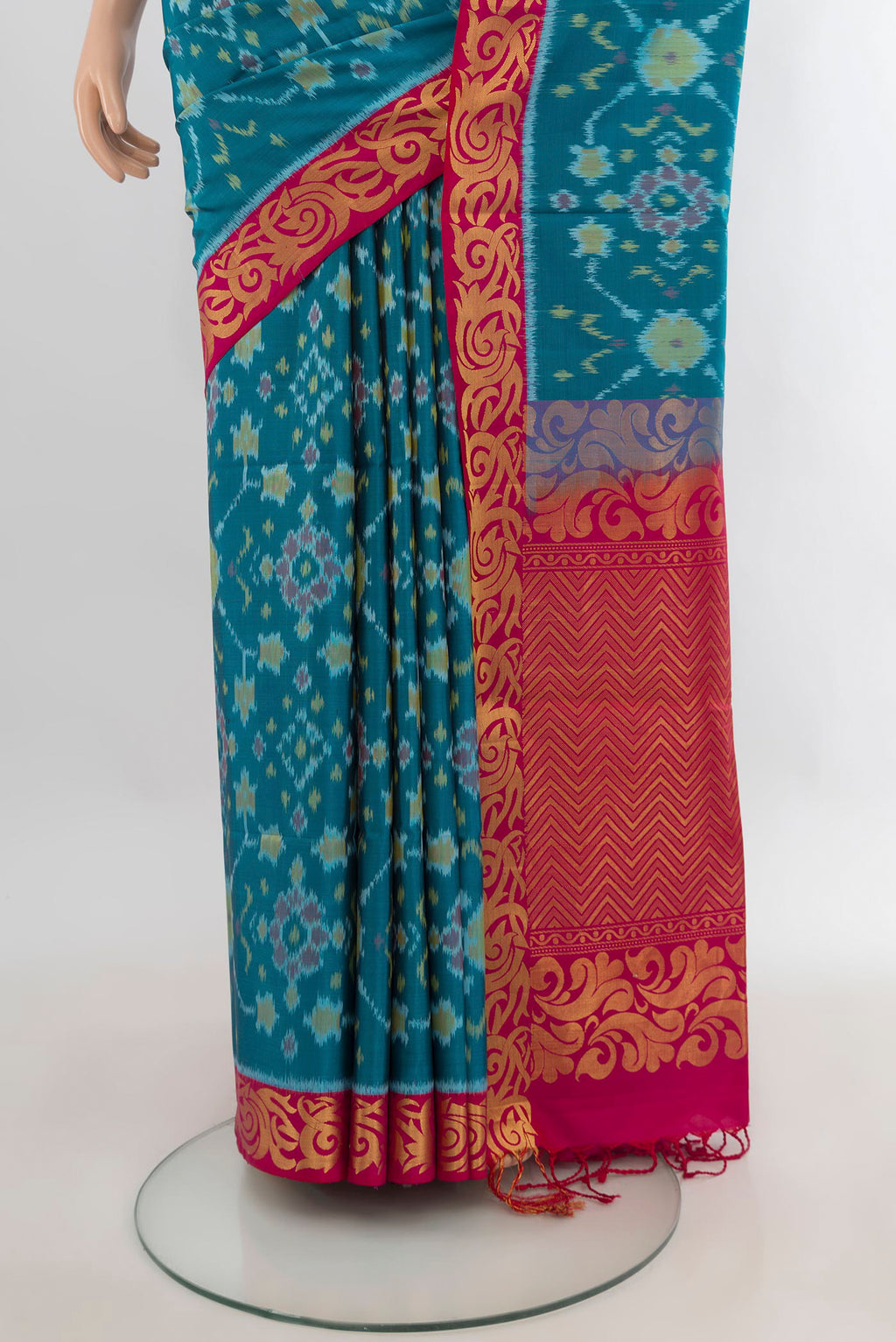 Pleats and pallu of Pure Silk Light Blue Soft Saree with Ikat Print on the body and Zari Border. 