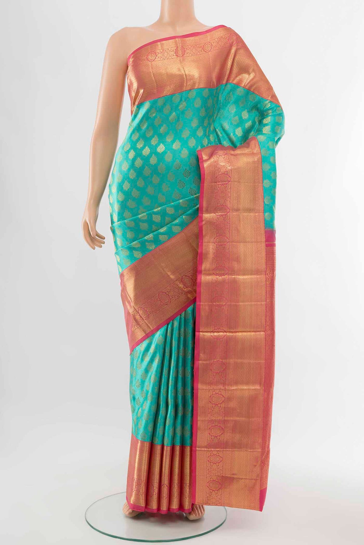 Sky Blue Kanchipuram Silk Saree with Zari Butta on the body and Silk Border displayed on a mannequin