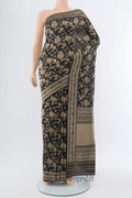Black Banarasi Katan Silk Saree with Zari Butta on the body and Silk Border.  displayed on a mannequin