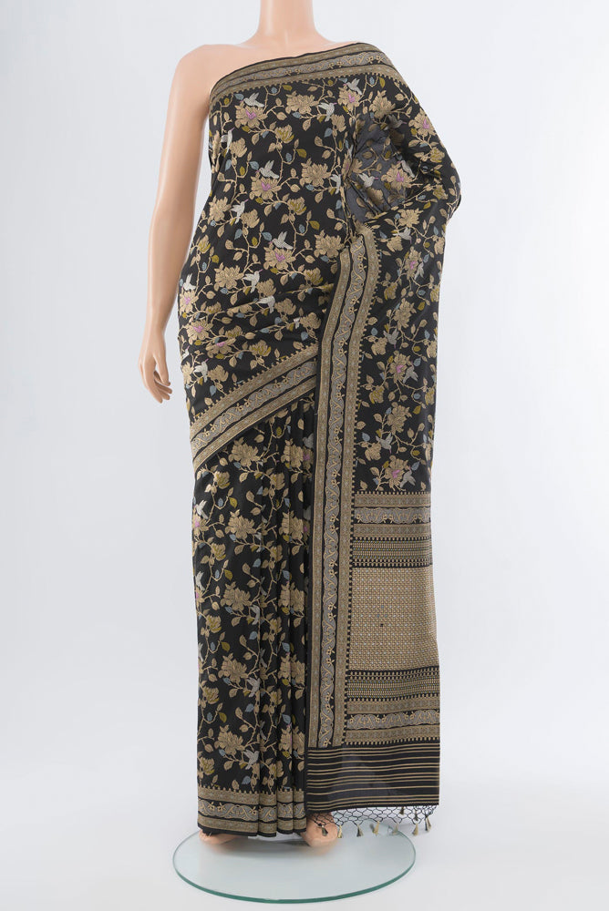 Black Banarasi Katan Silk Saree with Zari Butta on the body and Silk Border.  displayed on a mannequin