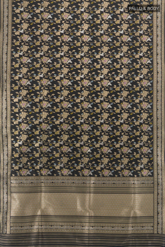 Flat view of Black Banarasi Katan Silk Saree with Zari Butta on the body and Silk Border. 