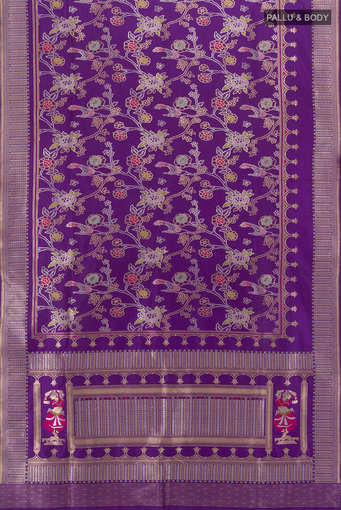 Flat view of Violet Banarasi Katan Silk Saree with Zari Butta on the body and Silk Border. 