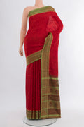 Red Printed Silk Saree with Floral Print on the body and Zari Border.  displayed on a mannequin