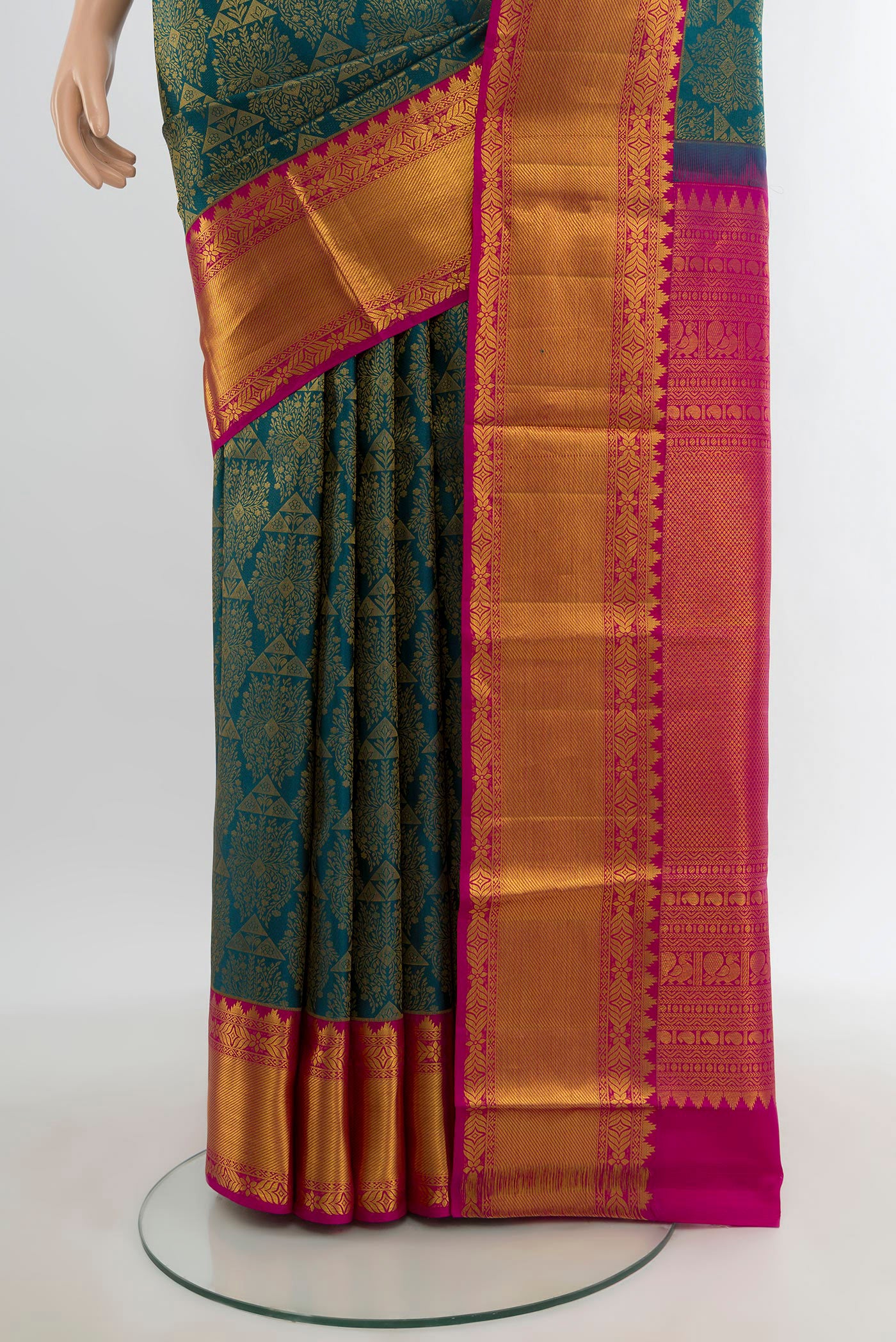 Pleats and pallu of Peacock Blue Kanchipuram Silk Saree with Zari Brocade on the body and Zari Border. 