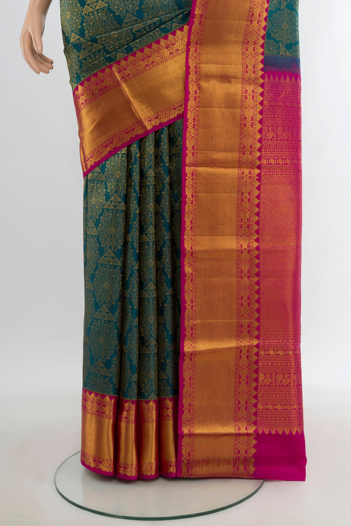 Pleats and pallu of Peacock Blue Kanchipuram Silk Saree with Zari Brocade on the body and Zari Border. 