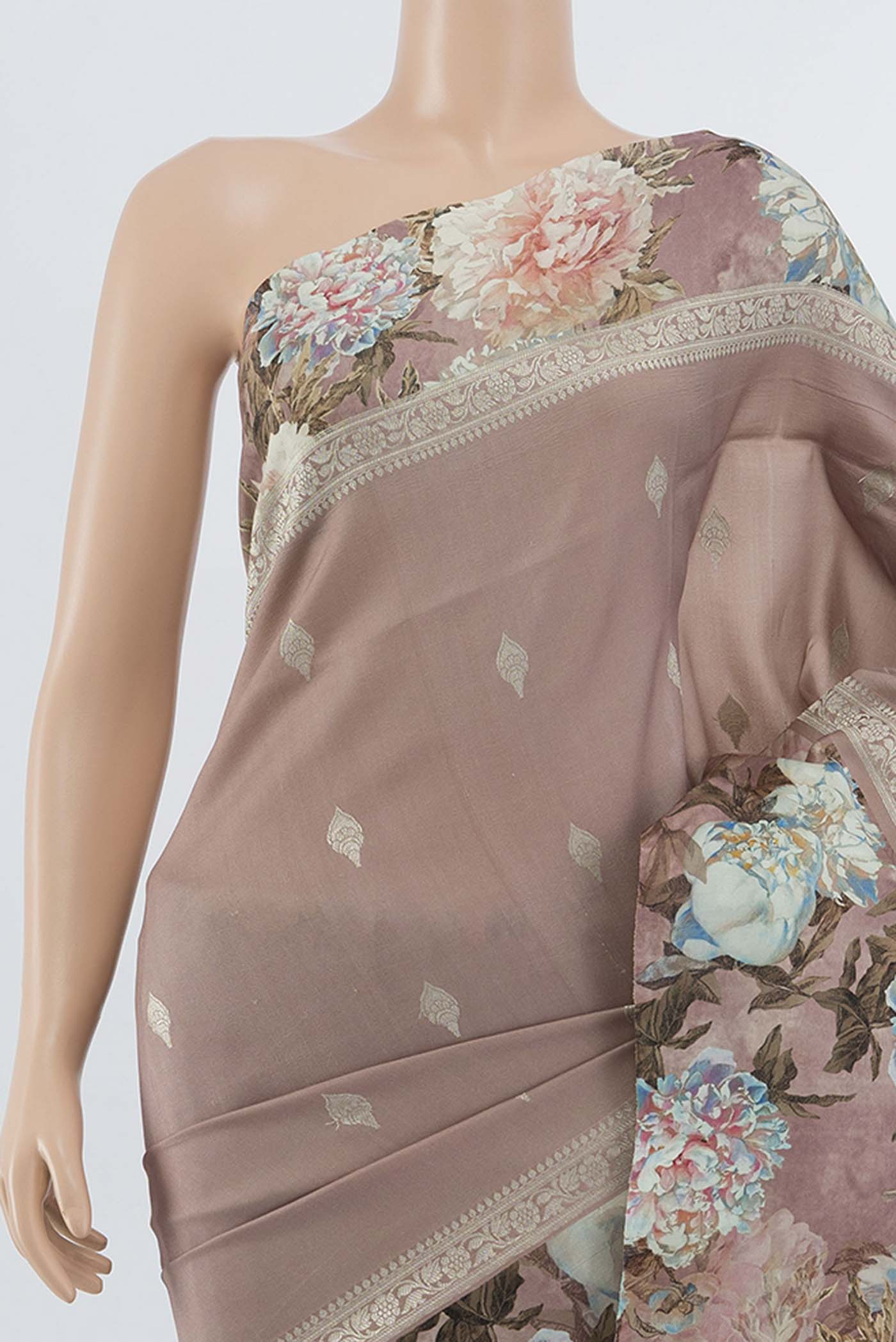 Border image of Pure Silk Pure Zari Peach Printed Saree with Floral Print on the body and Fancy Border