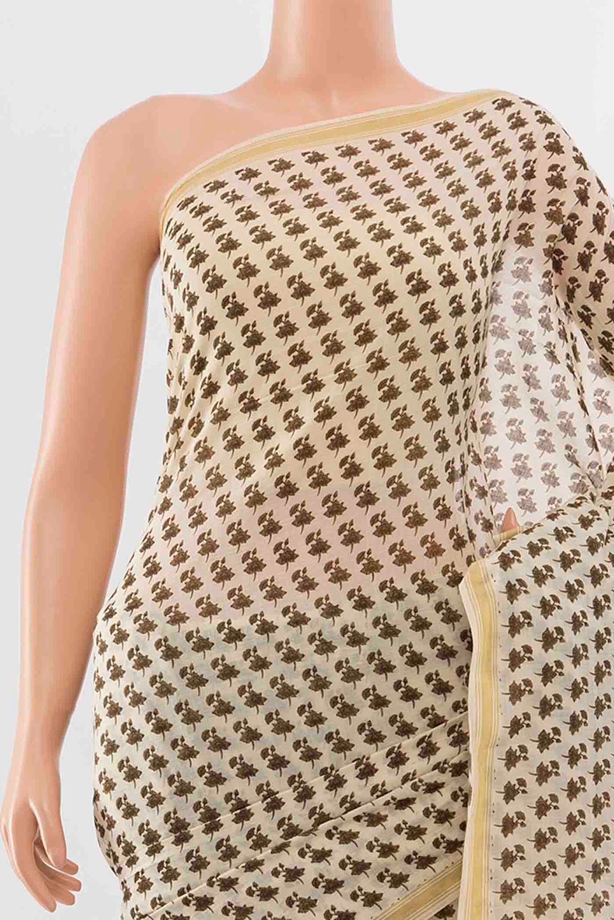 Border image of Brown Tussar Silk Saree with Zari Butta on the body and Silk Border