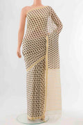 Brown Tussar Silk Saree with Zari Butta on the body and Silk Border displayed on a mannequin