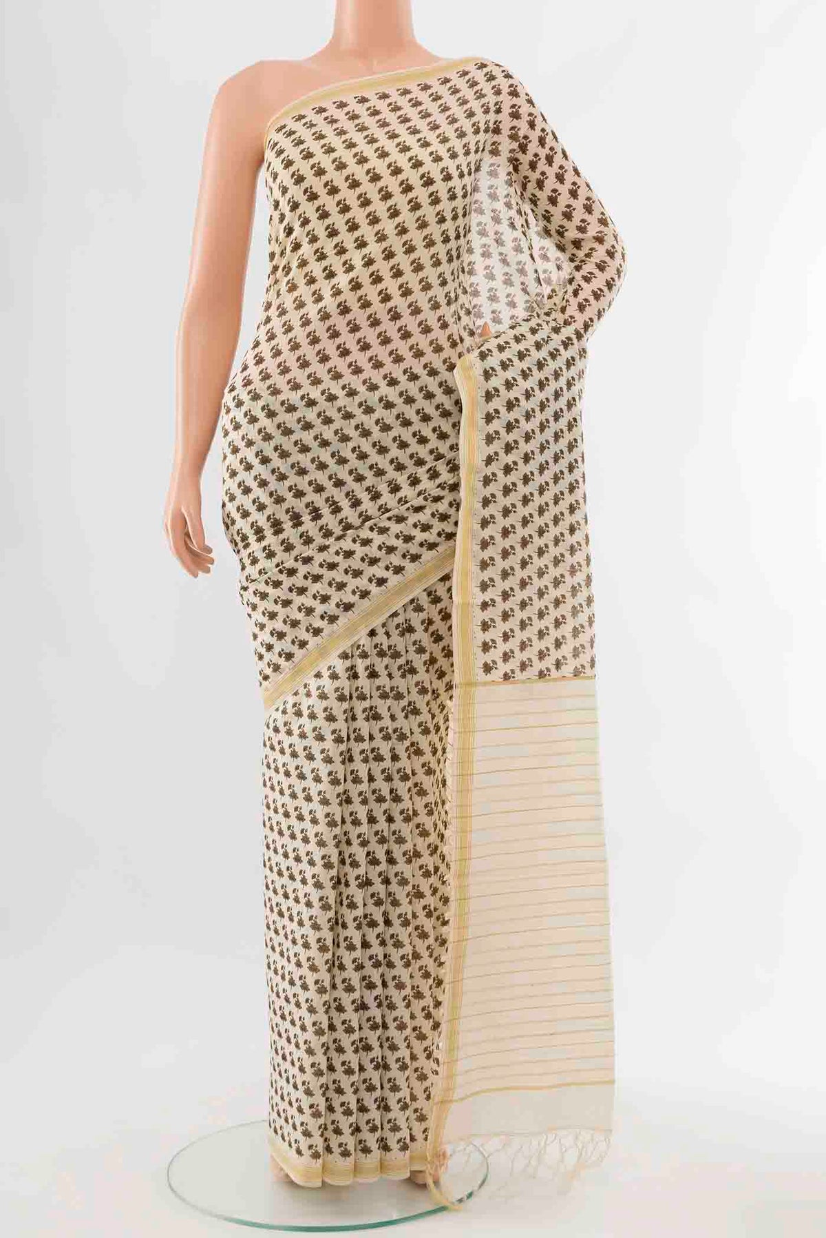 Brown Tussar Silk Saree with Zari Butta on the body and Silk Border displayed on a mannequin