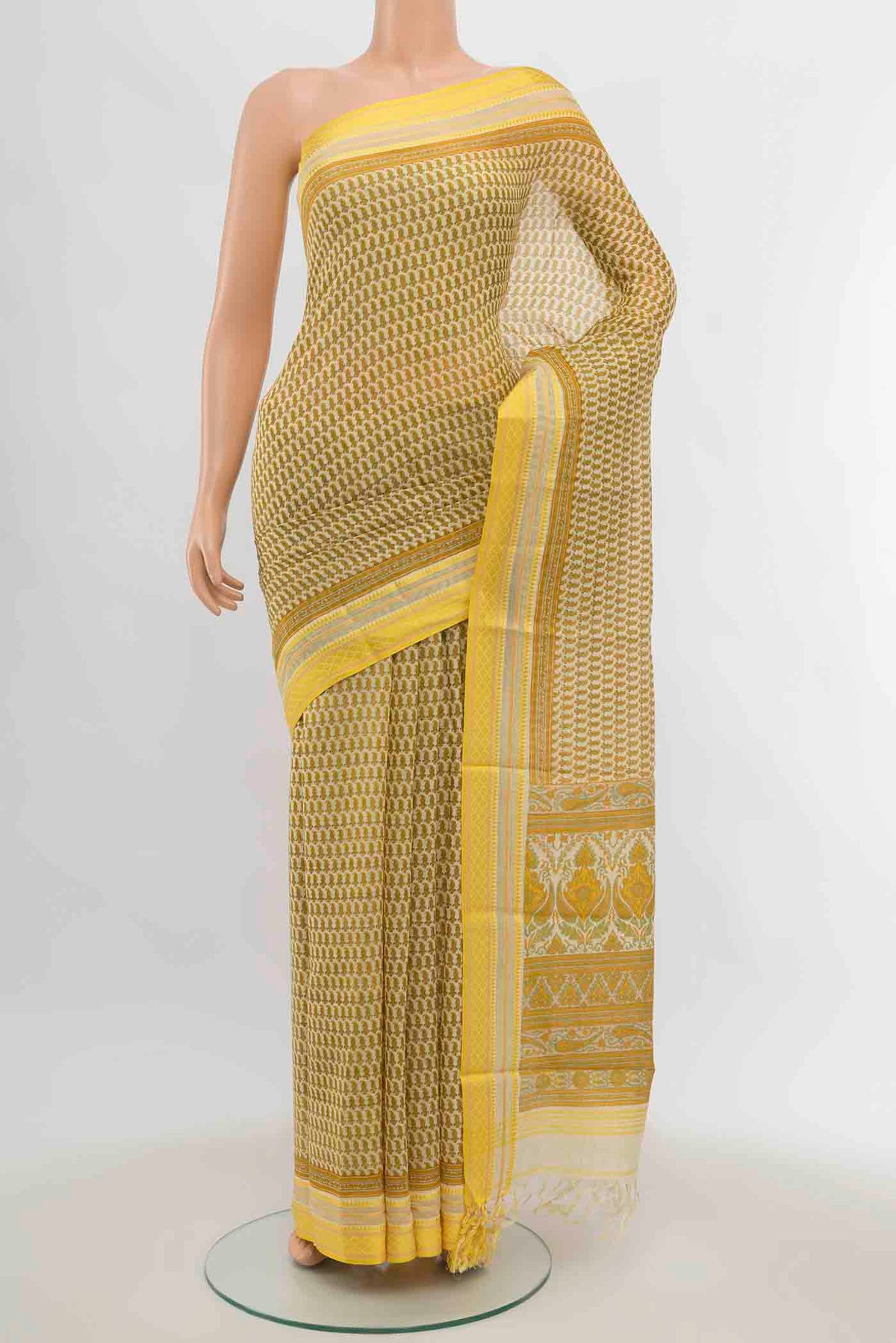 Cream Maheshwari Silk Cotton Saree with Zari Butta on the body and Silk Border displayed on a mannequin
