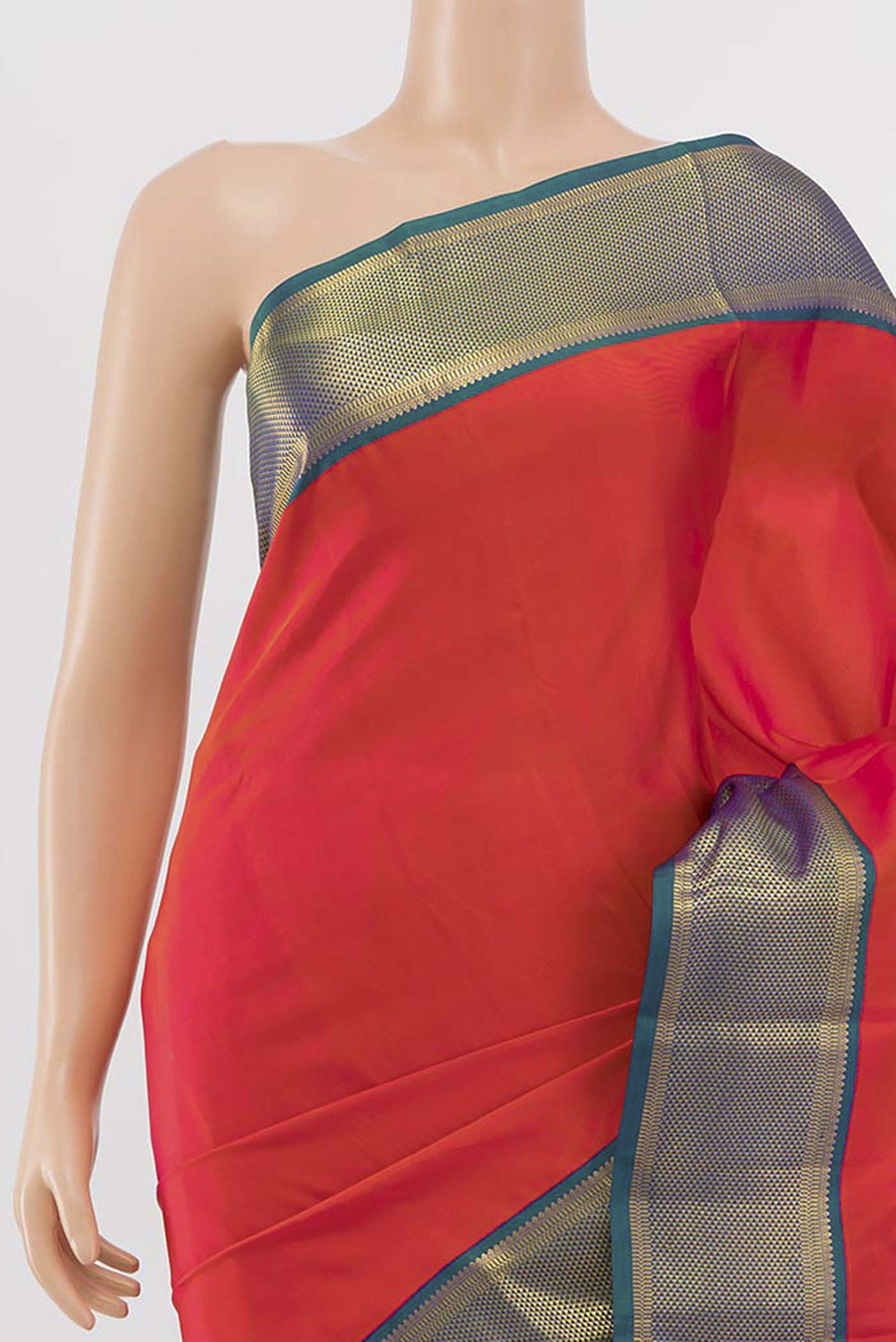 Border image of Orange Kanchipuram Silk Saree with Zari Butta on the body and Silk Border