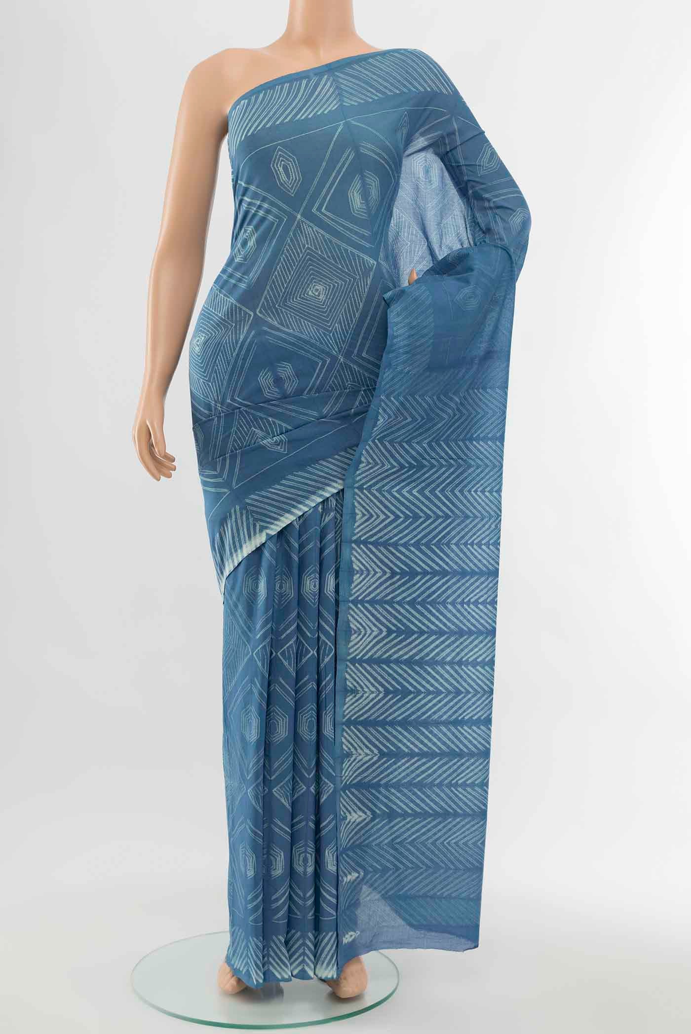 Blue Maheshwari Silk Cotton Saree with Printed design on the body and Printed Border displayed on a mannequin