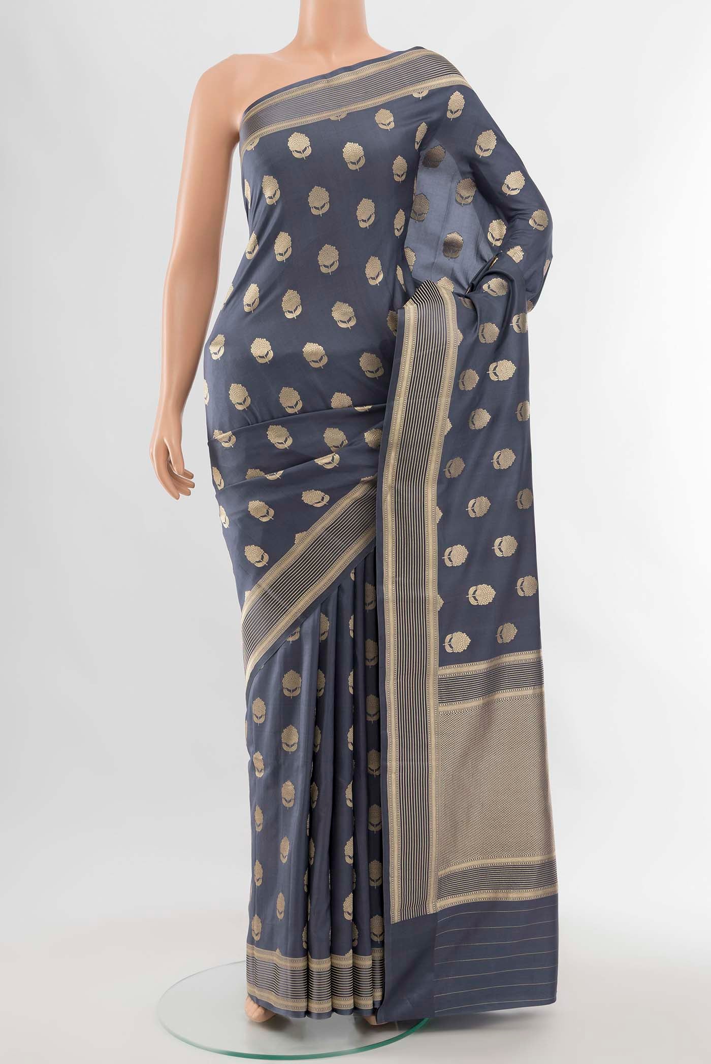 Grey Banarasi Silk Saree with Zari Butta on the body and Silk Border displayed on a mannequin