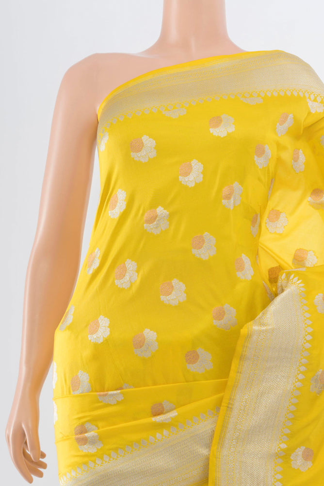 Border image of Lemon Yellow Banarasi Katan Silk Saree with Zari Butta on the body and Silk Border. 