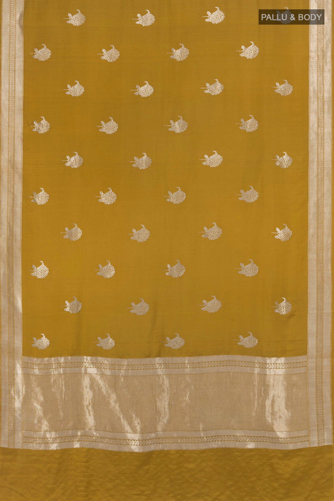 Flat view of Mehandi Green Banarasi Katan Silk Saree with Zari Butta on the body and Silk Border. 