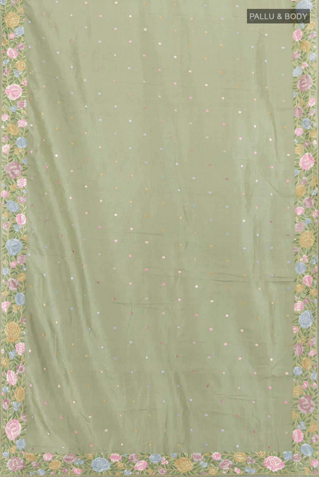 Flat view of Pista Green Tussar Silk Saree with Embroidery on the body and Embroidery Border. 