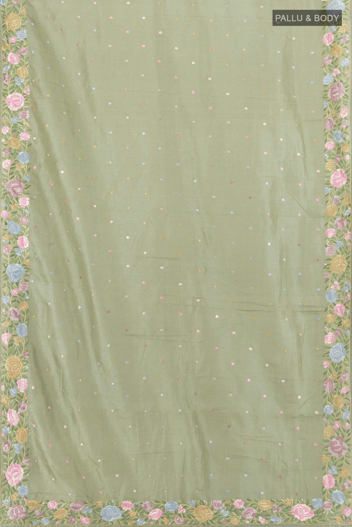 Flat view of Pista Green Tussar Silk Saree with Embroidery on the body and Embroidery Border. 