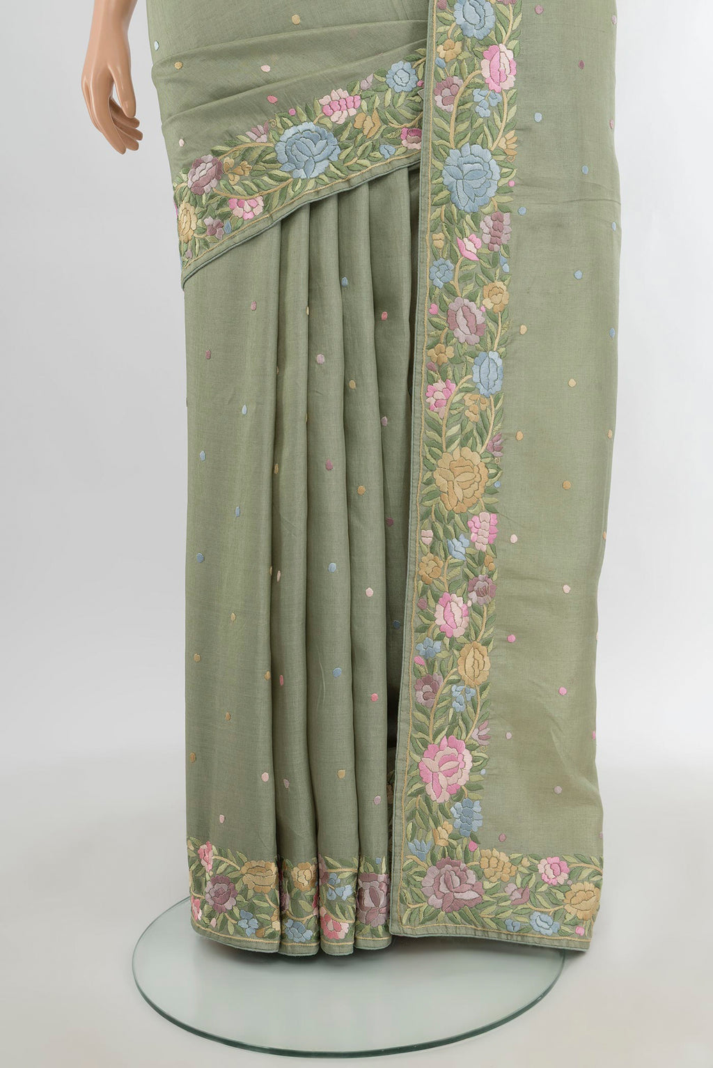 Pleats and pallu of Pista Green Tussar Silk Saree with Embroidery on the body and Embroidery Border. 