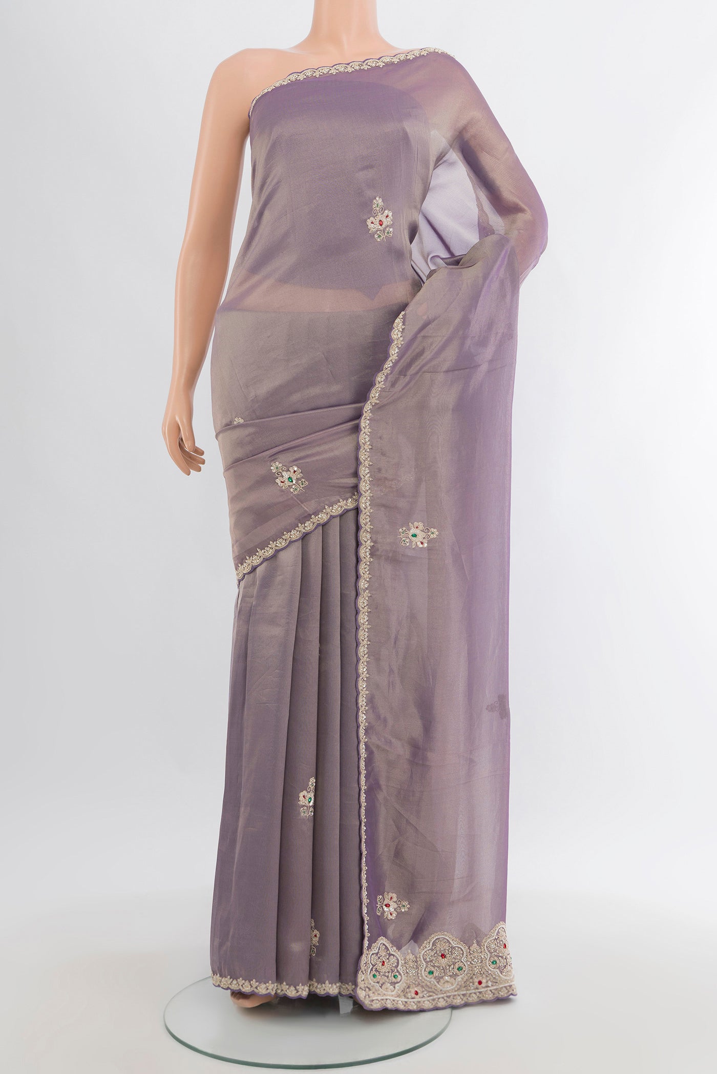 Lavender Tissue Silk Saree with Embroidery on the body and Embroidery Border.  displayed on a mannequin