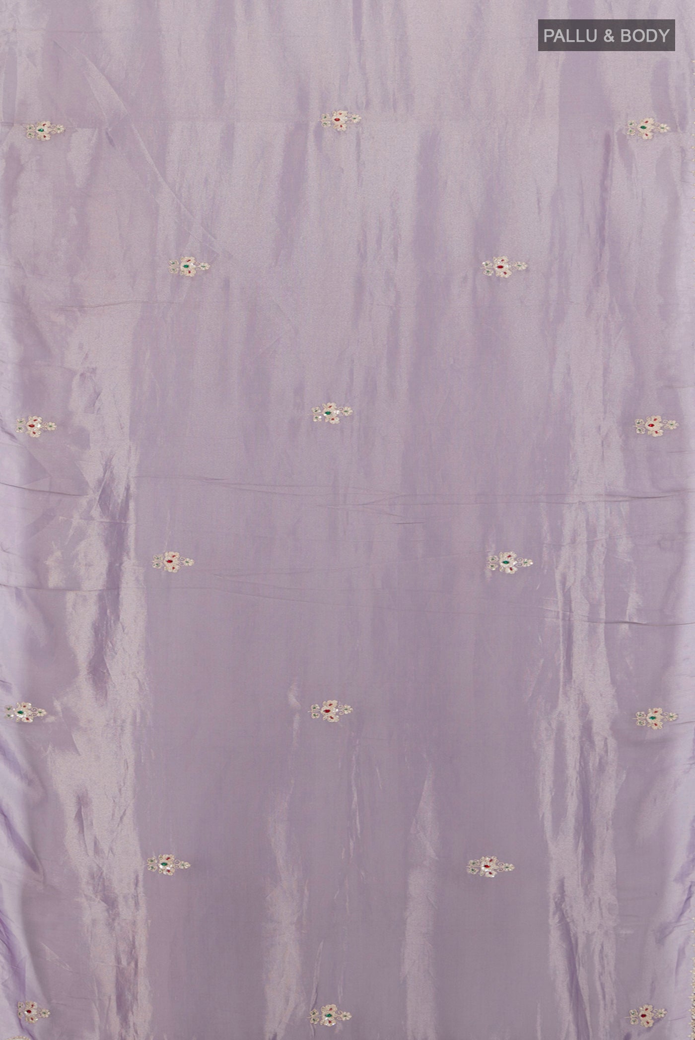 Flat view of Lavender Tissue Silk Saree with Embroidery on the body and Embroidery Border. 