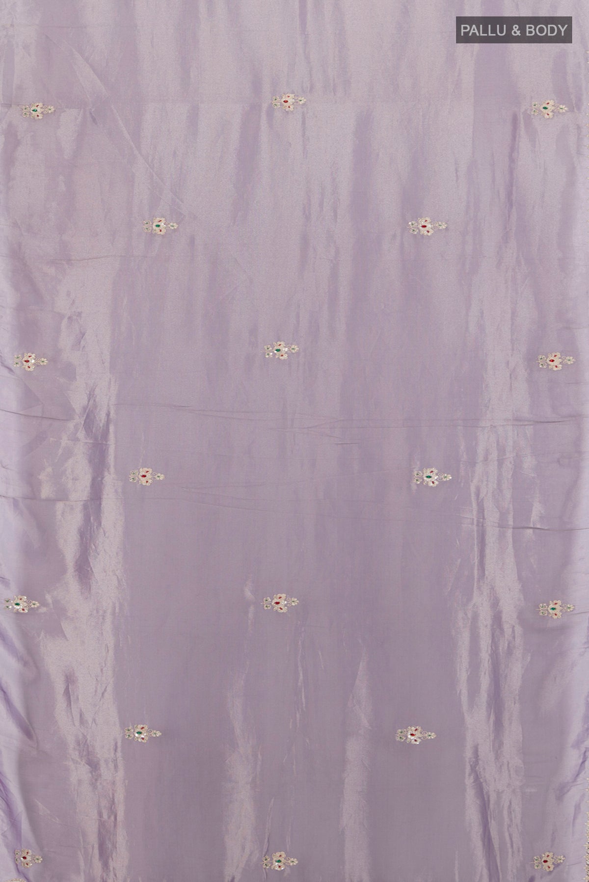 Flat view of Lavender Tissue Silk Saree with Embroidery on the body and Embroidery Border. 