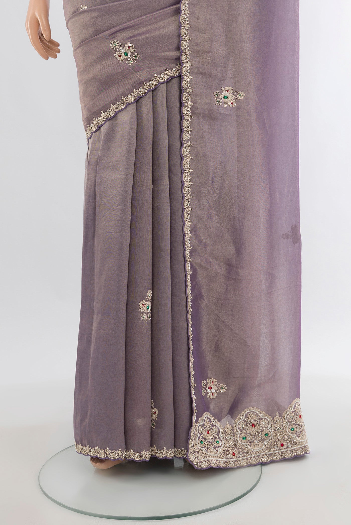 Pleats and pallu of Lavender Tissue Silk Saree with Embroidery on the body and Embroidery Border. 