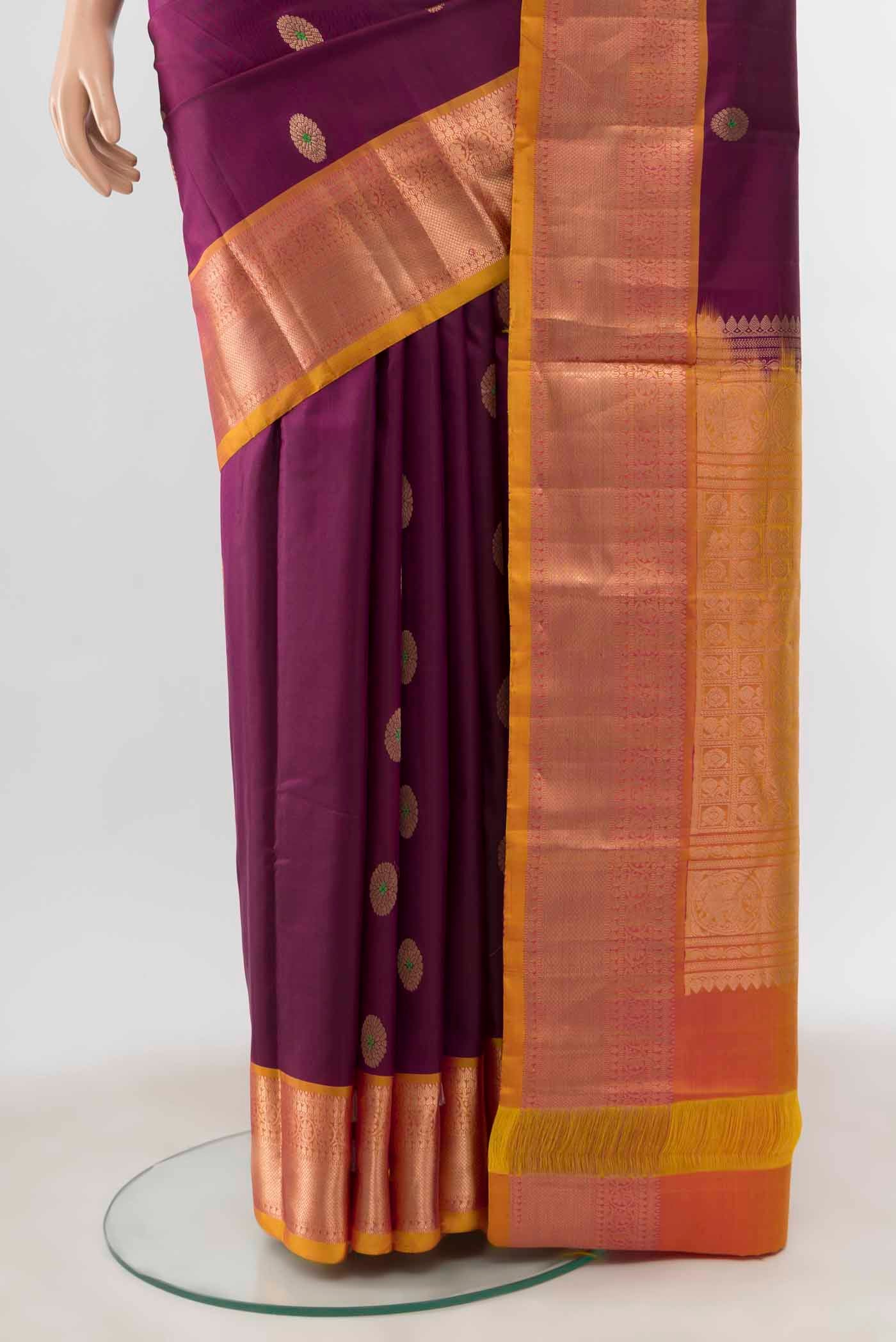 Pleats and pallu of Purple Kanchipuram Silk Nine Yards Saree with Zari Butta on the body and Silk Border