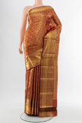 Golden Kanchipuram Silk Saree with Zari Butta on the body and Silk Border.  displayed on a mannequin