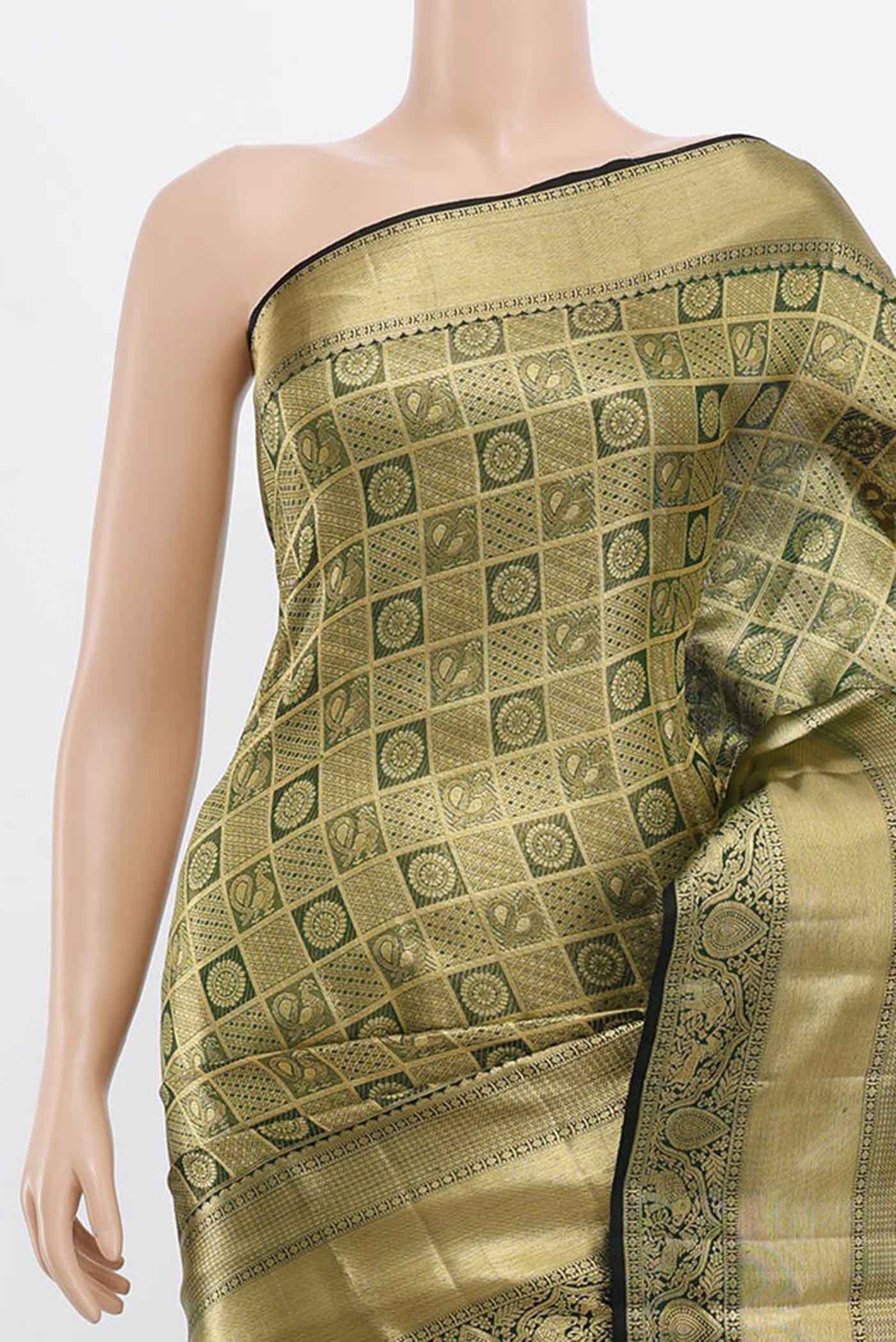 Border image of Golden Kanchipuram Silk Saree with Zari Butta on the body and Silk Border. 