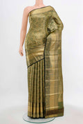 Golden Kanchipuram Silk Saree with Zari Butta on the body and Silk Border.  displayed on a mannequin