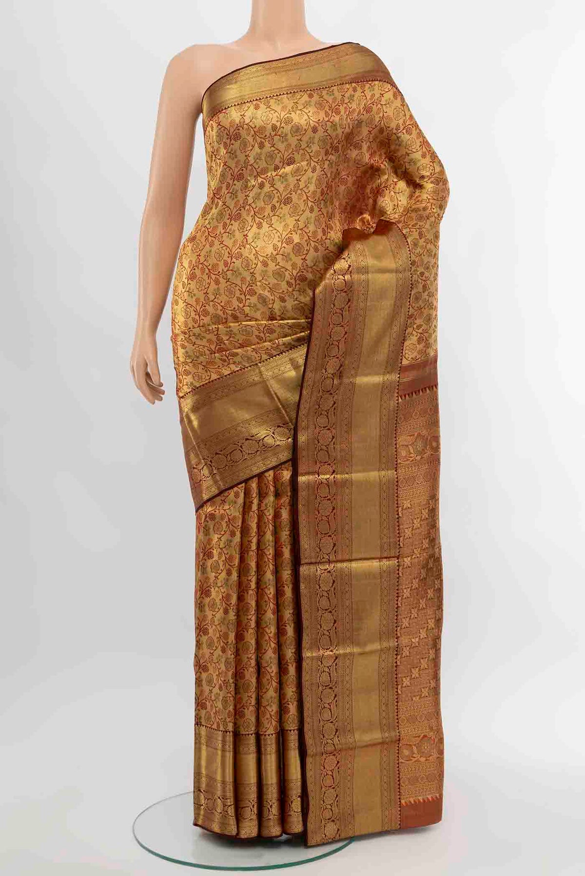 Golden Kanchipuram Silk Saree with Zari Butta on the body and Silk Border displayed on a mannequin