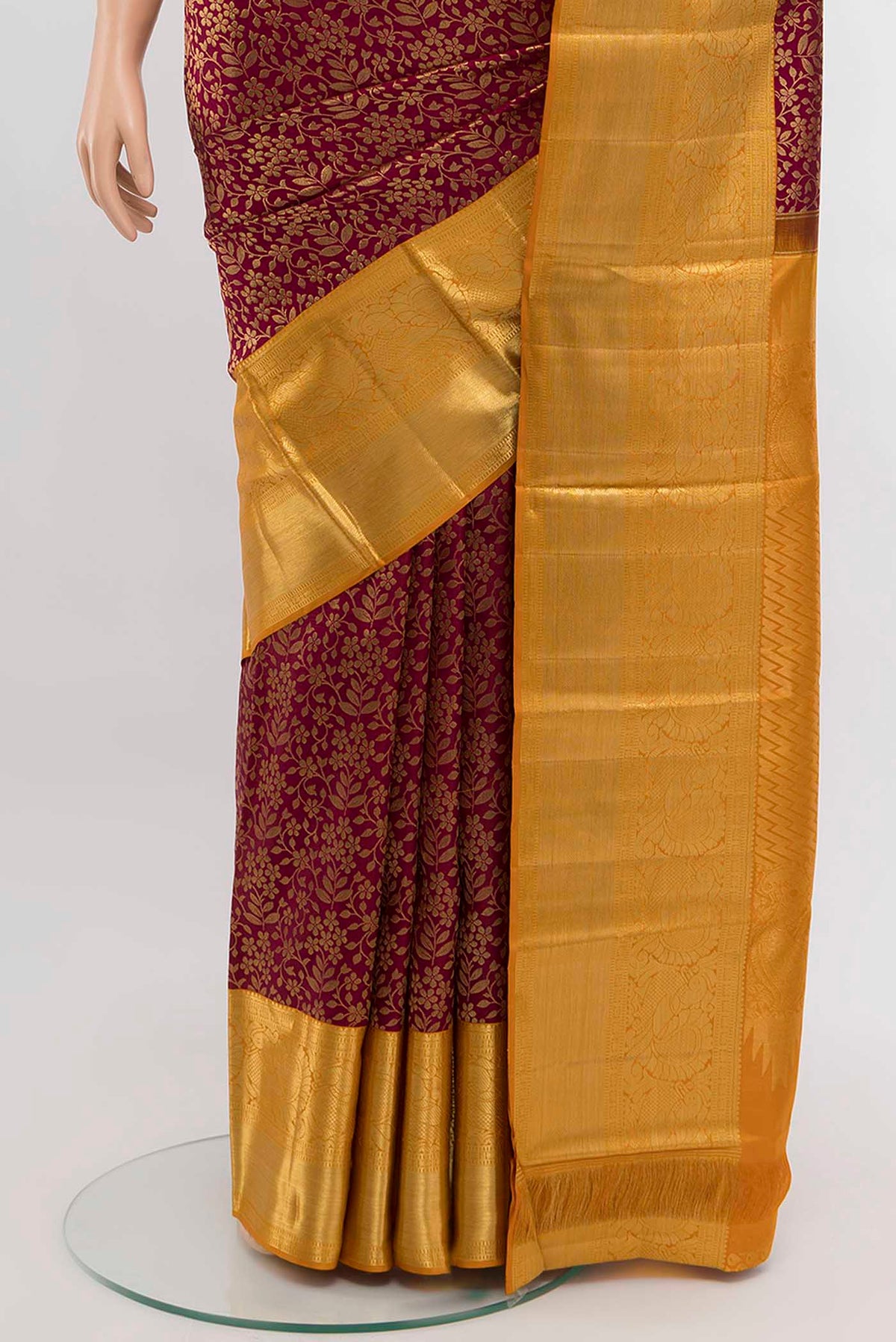Pleats and pallu of Magenta Kanchipuram Silk Saree with Zari Brocade on the body and Silk Border