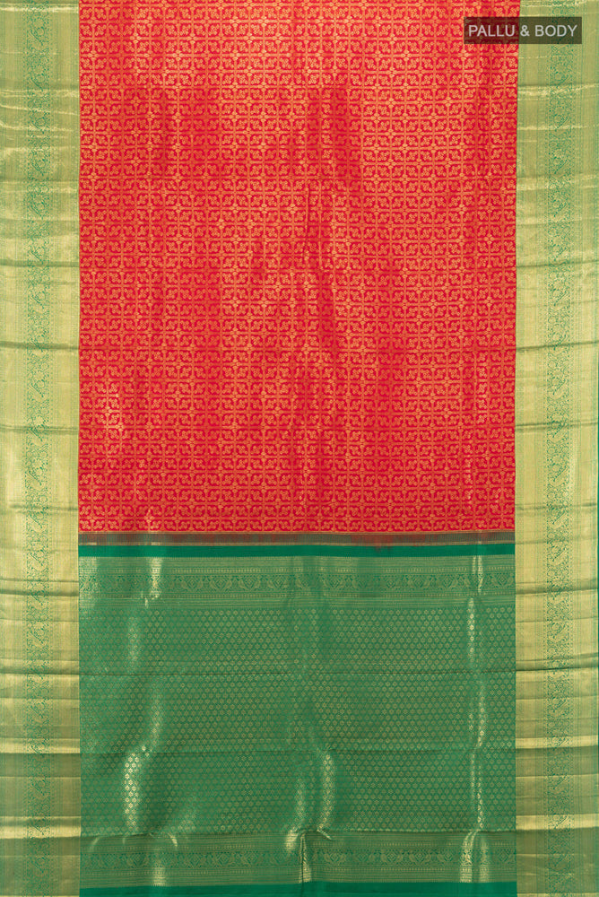 Flat view of Red Kanchipuram Silk Saree with Zari Butta on the body and Silk Border. 