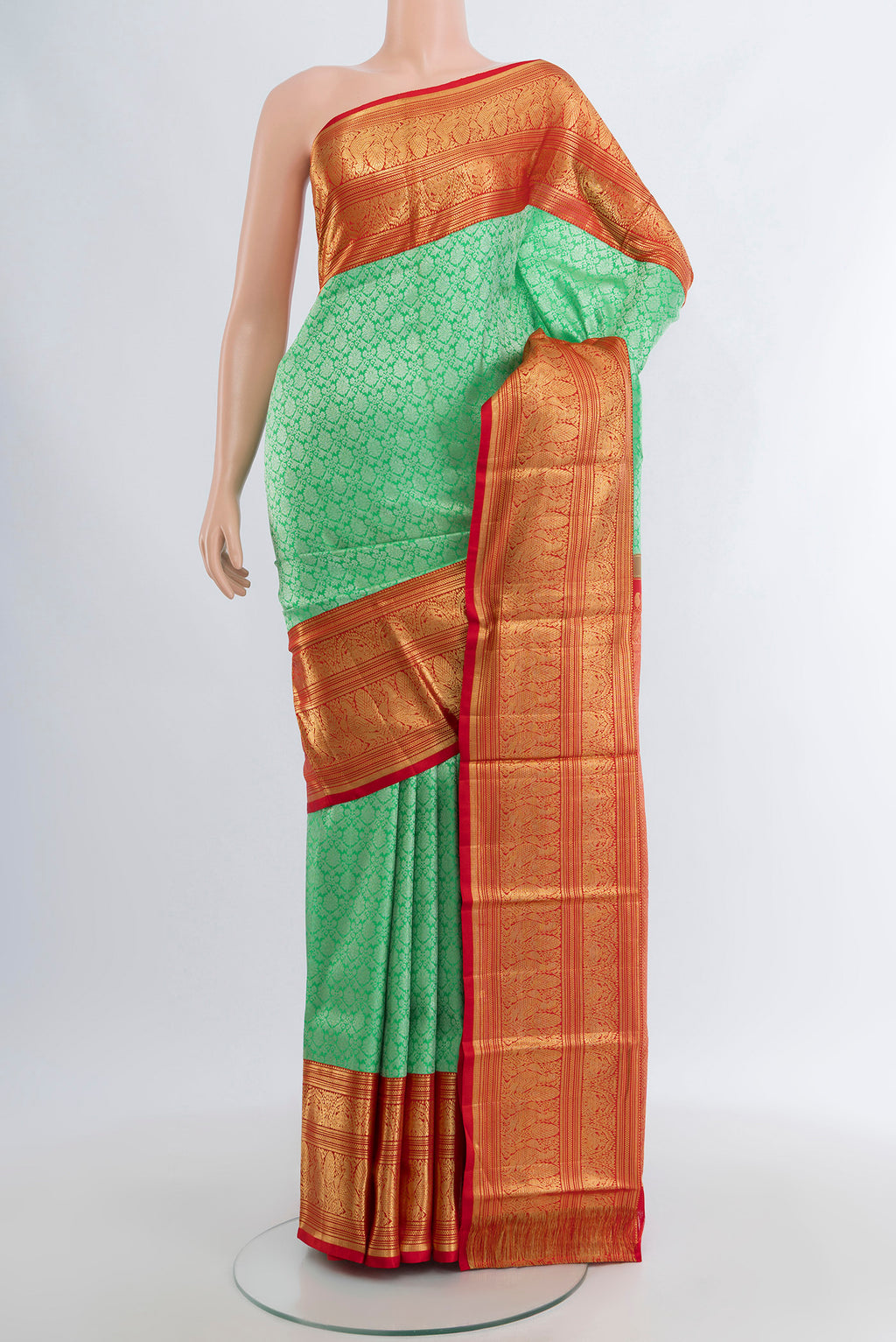 Sea Green Kanchipuram Silk Saree with Zari Brocade on the body and Zari Border.  displayed on a mannequin