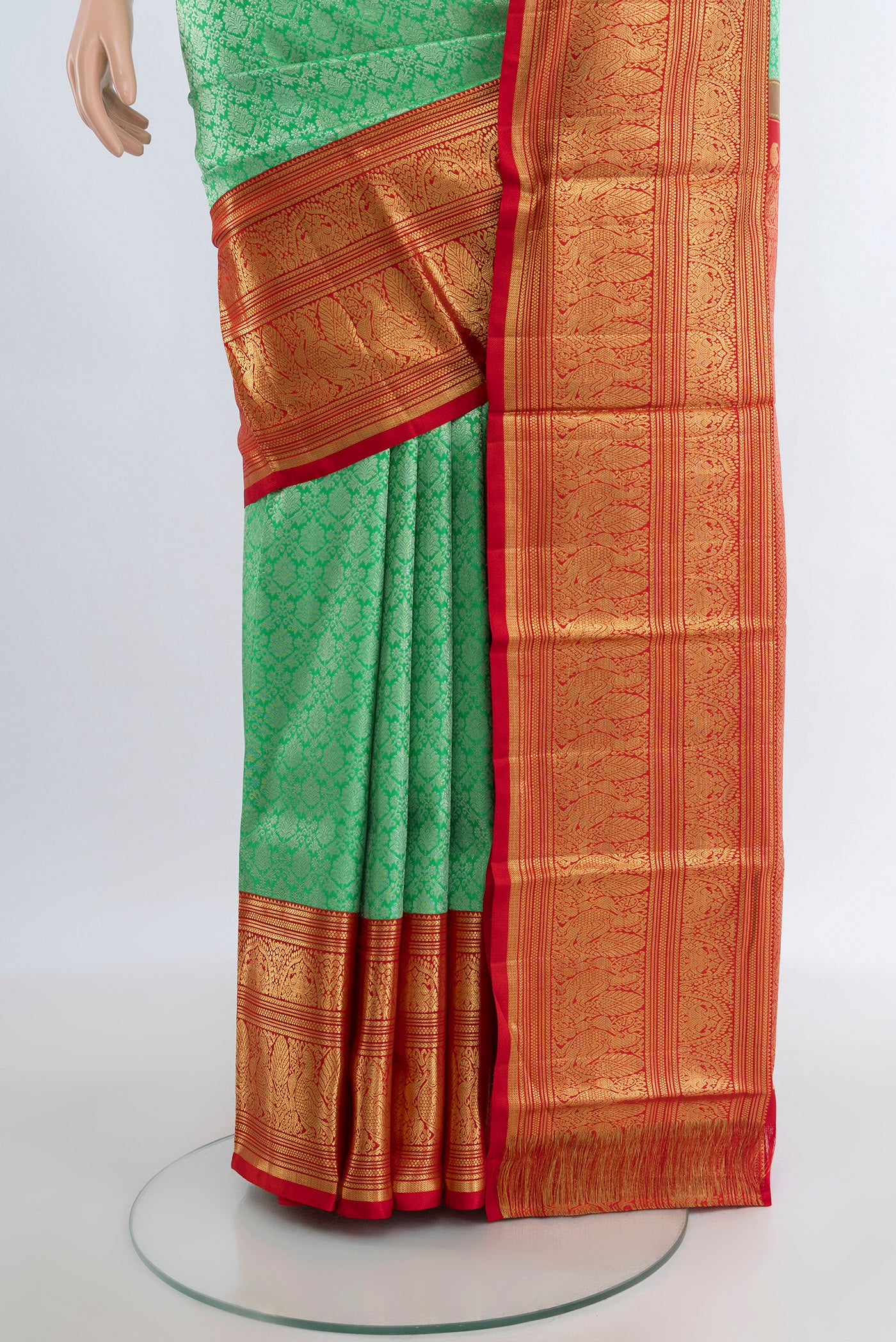 Pleats and pallu of Sea Green Kanchipuram Silk Saree with Zari Brocade on the body and Zari Border. 
