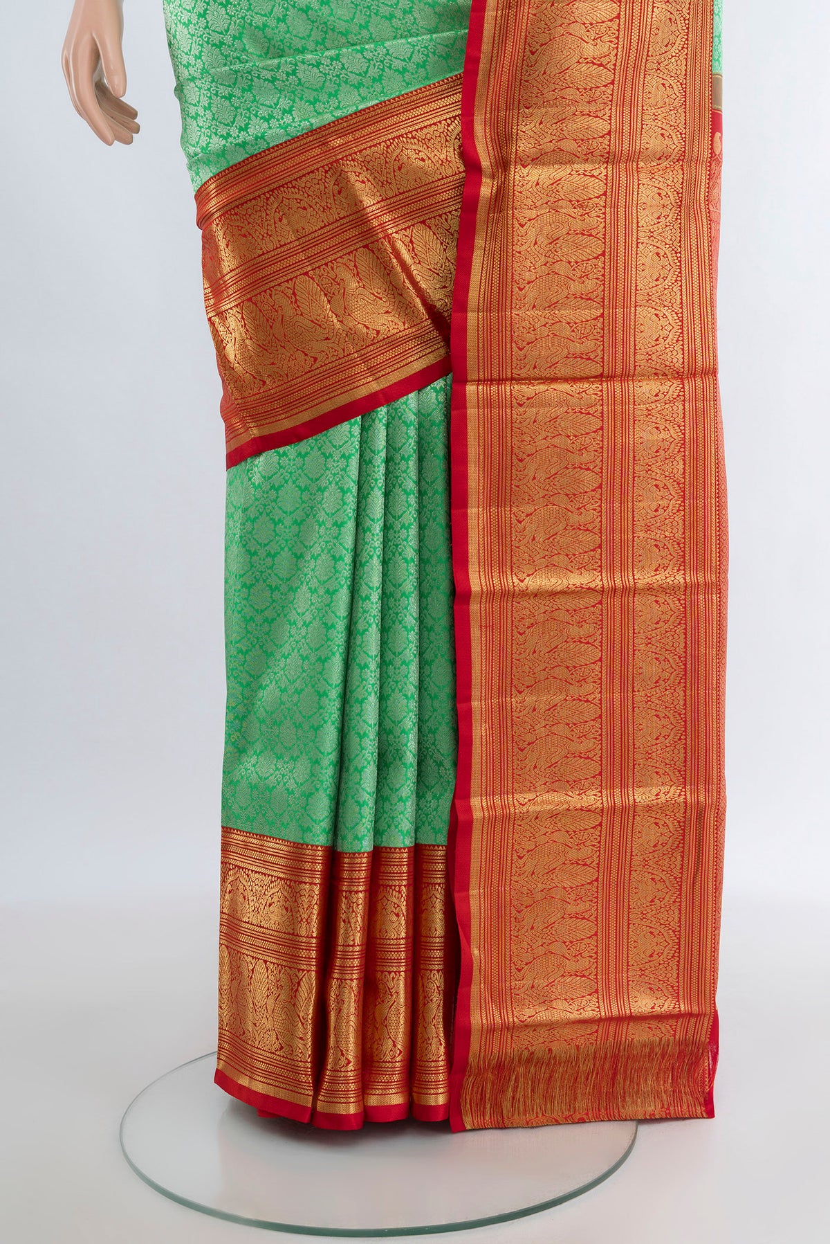 Pleats and pallu of Sea Green Kanchipuram Silk Saree with Zari Brocade on the body and Zari Border. 