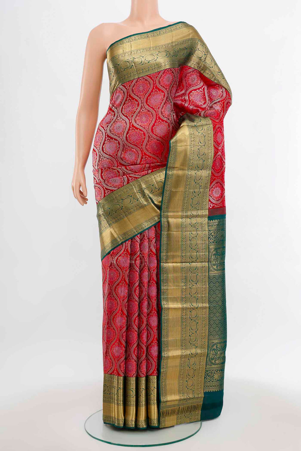Deep Red Kanchipuram Silk Saree with Zari Butta on the body and Silk Border.  displayed on a mannequin