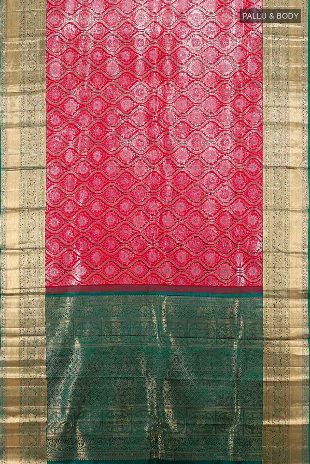 Flat view of Deep Red Kanchipuram Silk Saree with Zari Butta on the body and Silk Border. 