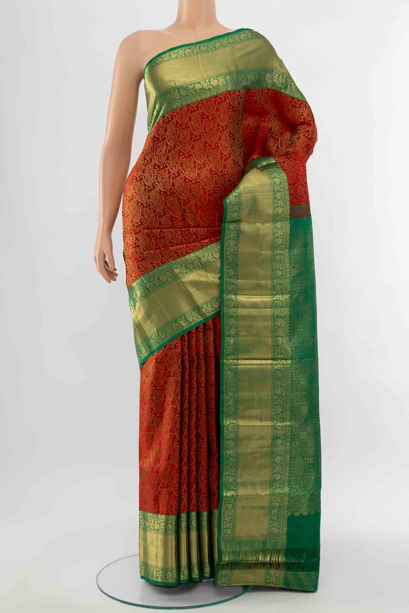 Red Kanchipuram Silk Saree with Zari Butta on the body and Silk Border displayed on a mannequin