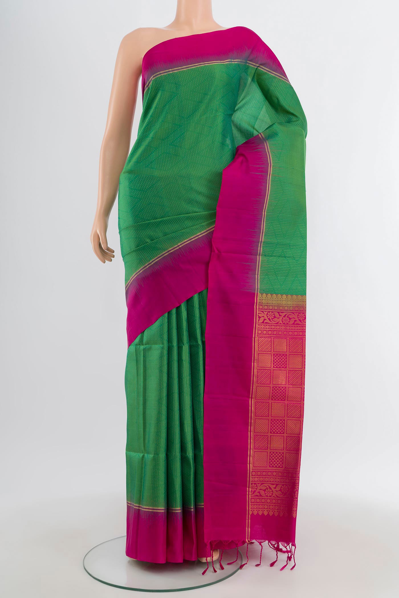 Light Green Soft Silk Saree with Stripes on the body and Plain Border.  displayed on a mannequin