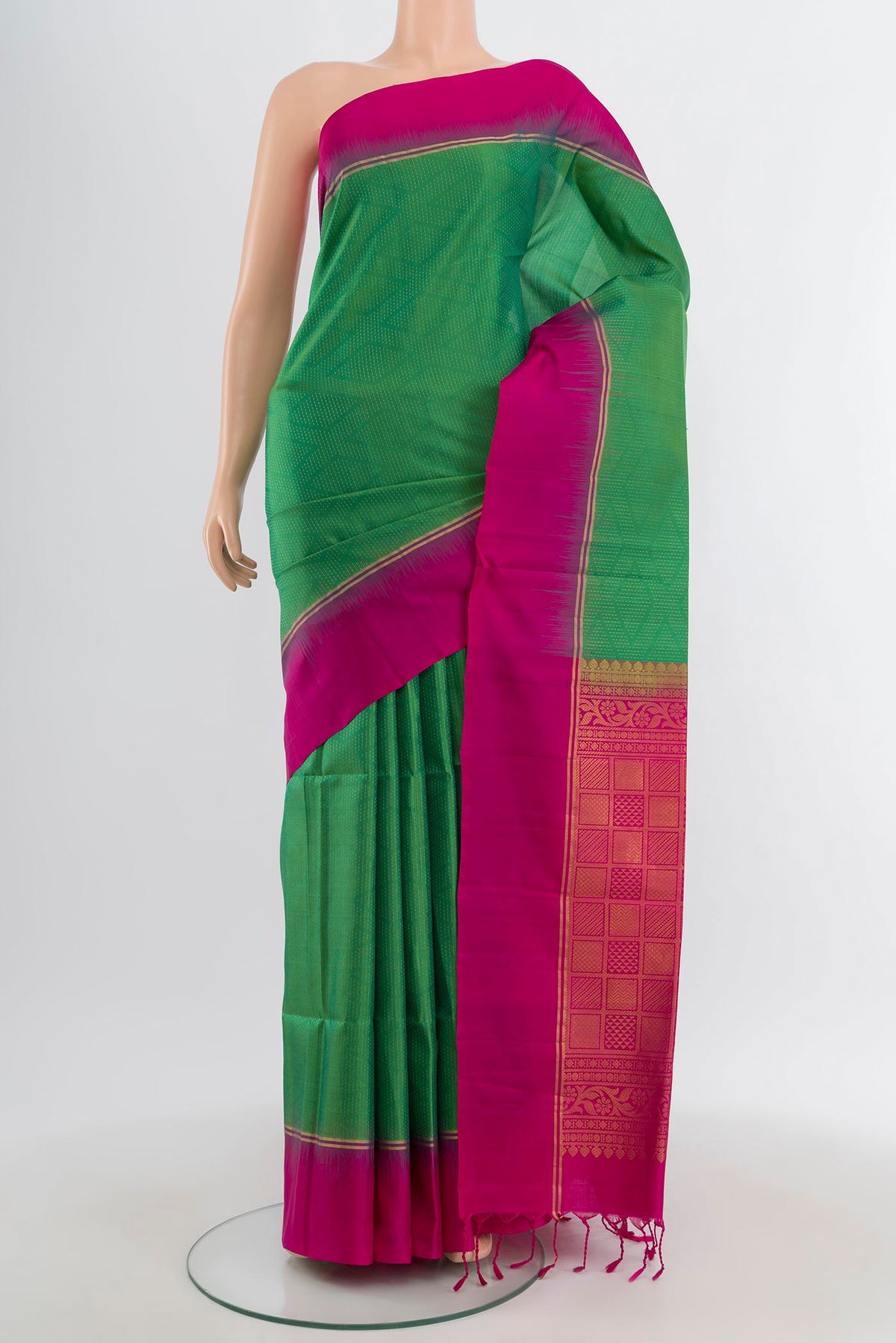Light Green Soft Silk Saree with Stripes on the body and Plain Border.  displayed on a mannequin