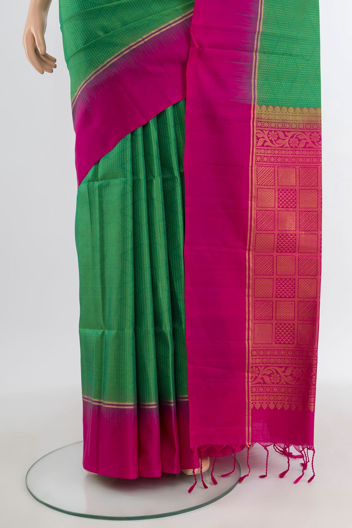 Pleats and pallu of Light Green Soft Silk Saree with Stripes on the body and Plain Border. 