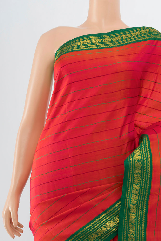 Border image of Pure Silk Pure Zari Peach Kanjivaram Saree with Zari Butta on the body and Silk Border. 