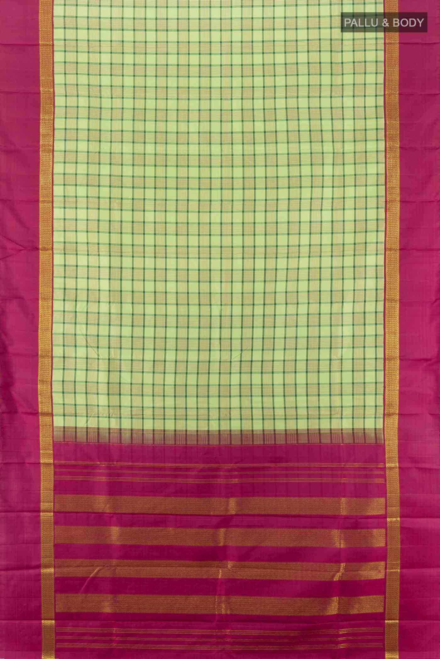 Flat view of Light Green Kanjivaram Silk Saree with Zari Butta on the body and Silk Border. 