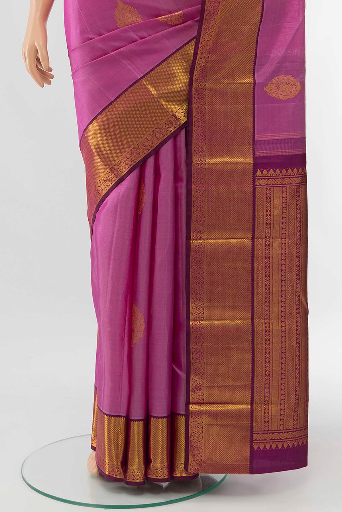 Pleats and pallu of Pink Kanchipuram Silk Saree with Zari Butta on the body and Zari Border