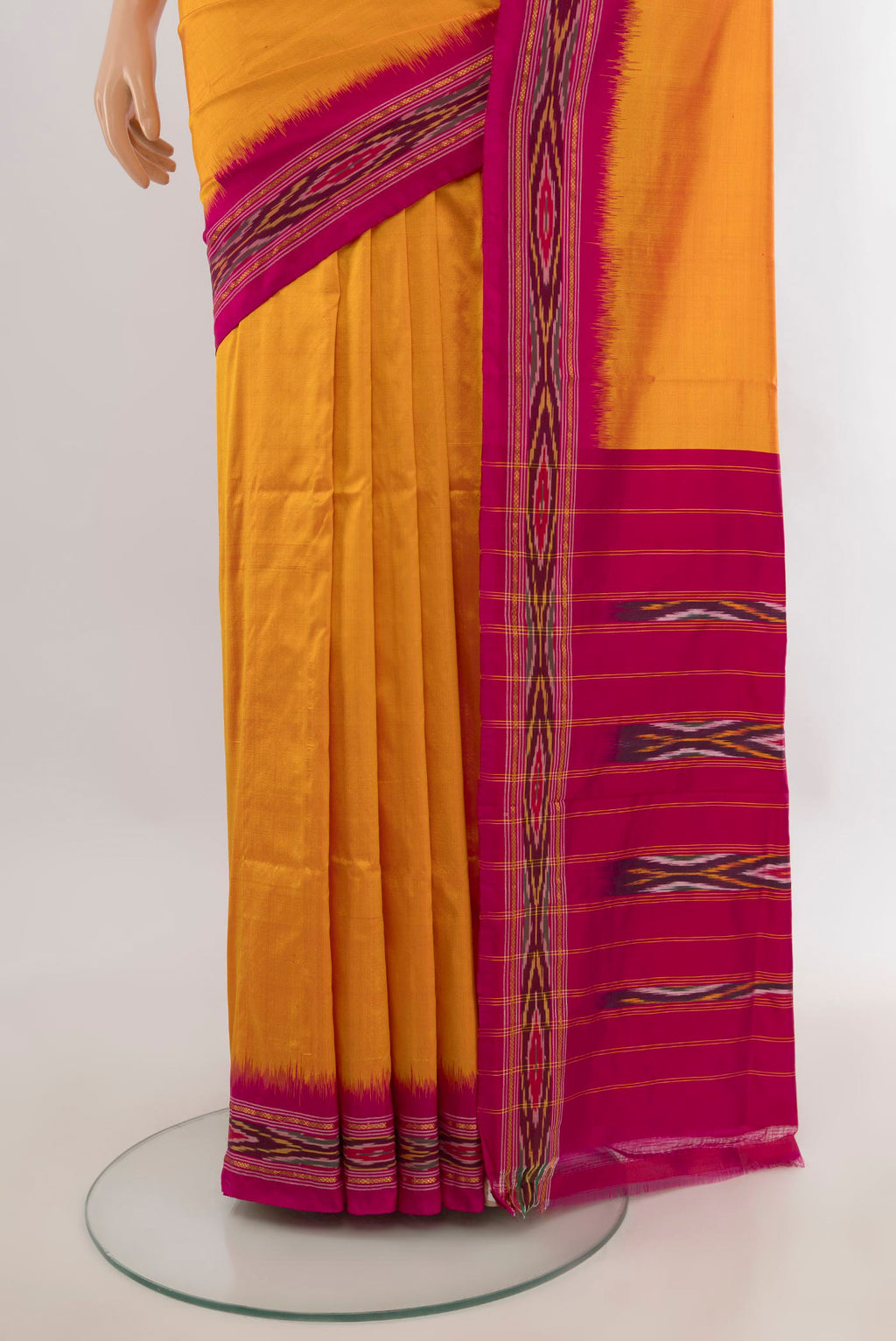 Pleats and pallu of Pure Silk Yellow Pochampally Saree with Plain Body and Ikat Border. 